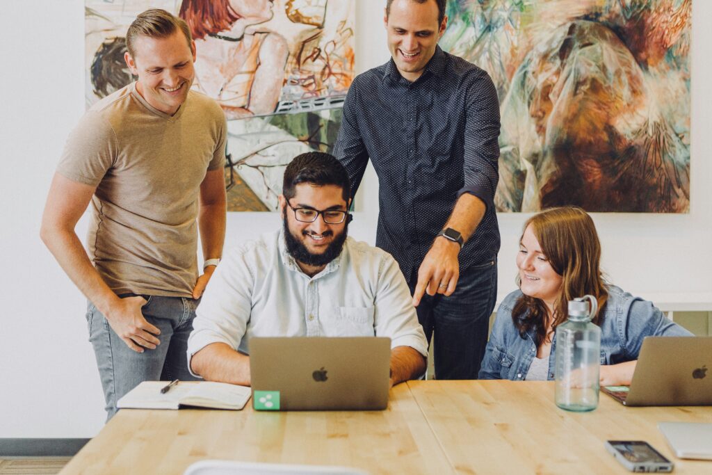 CatapultAI team developing AI programs to help organizations scale and implement artificial intelligence successfully.