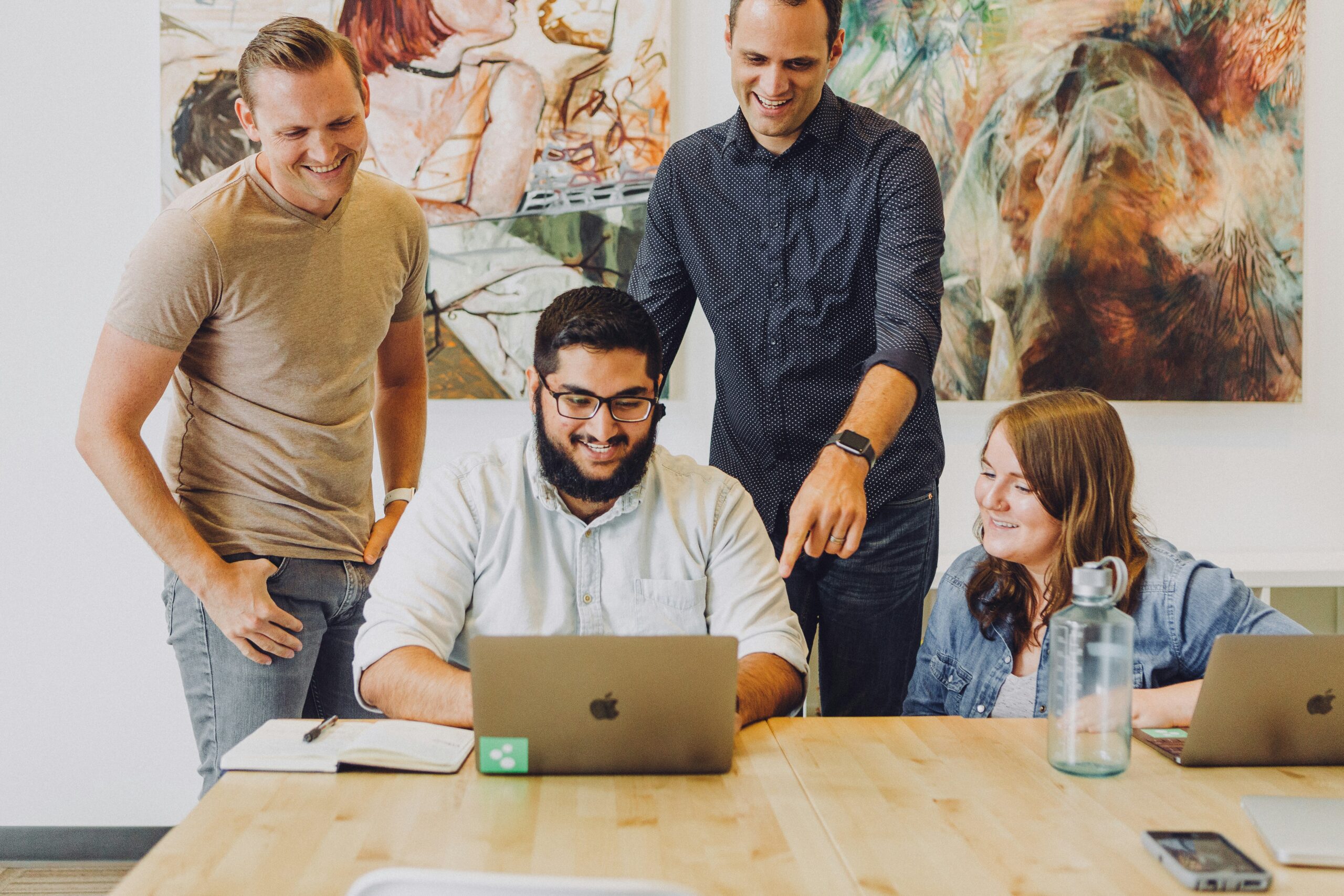 CatapultAI team developing AI programs to help organizations scale and implement artificial intelligence successfully.